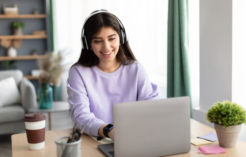 Person using computer to apply for visa