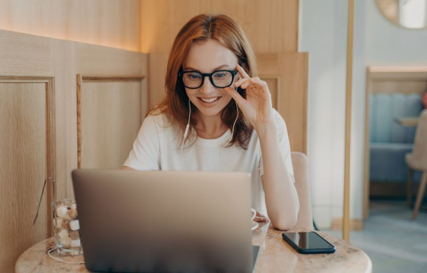 Person using laptop to apply for visa