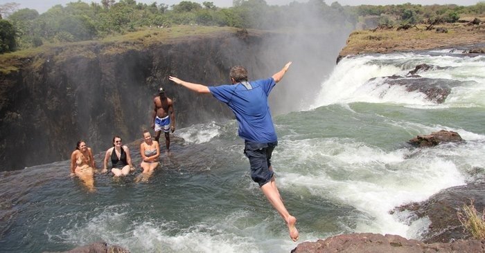 Only a few places on Earth let you swim this close to a UNESCO World Heritage Site - Angel’s Pool is one of them